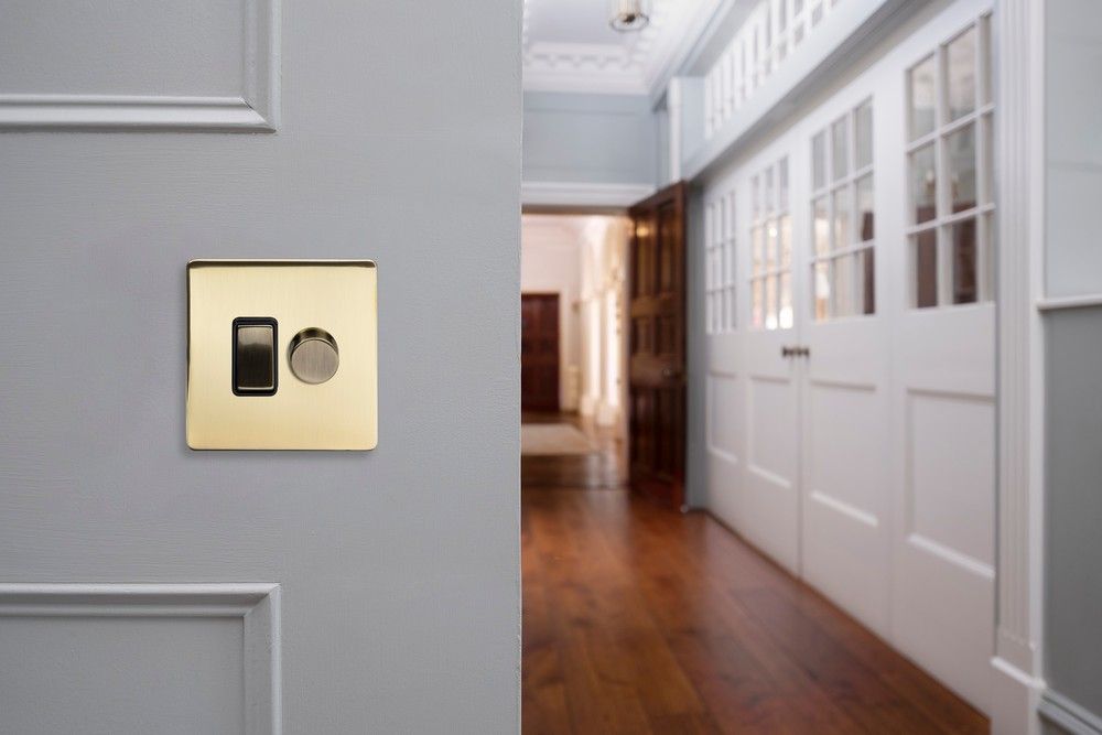 Soho Lighting Brushed Brass dimmer and rocker switch combo Blk Ins Screwless Elesi