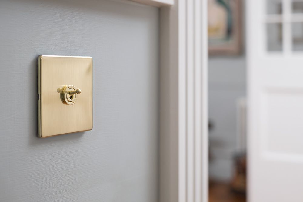 brushed brass sockets and switches