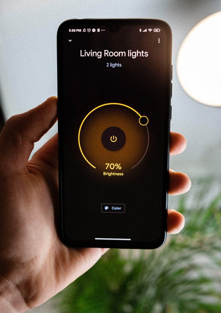 A smartphone controlling living room lights